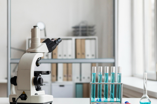 Photo creds: FreePik - A Lab with beakers of chemicals after Oscrete's recent expansion 