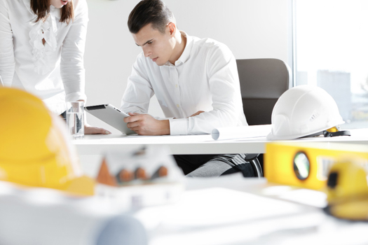 (Creds: FreePik) Two engineers or designers working on construction project to symbolise the ending of the skills crisis