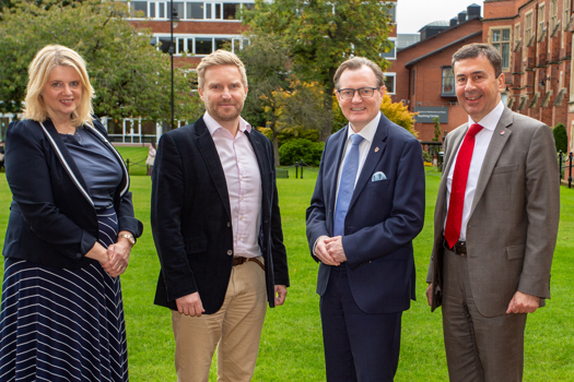 (L-R) Katherine Bennett CBE, HVM Catapult CEO; Sam Turner, HVM Catapult CTO, and incoming AMIC CEO; Professor Ian Greer, Queen’s University vice-chancellor; Professor Paul Maropoulos, AMIC director