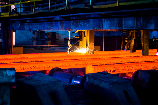 Creds: FreePik - Interior view of a steel factory after Sev.en Global Investments 